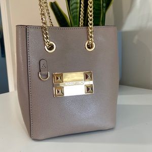 Tan bucket bag with gold hardware- Valentino by Mario Valentino